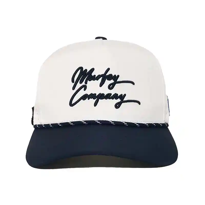 Front view of a white and navy trucker cap featuring an embroidered “Murley Company” logo on the front panel with a navy brim and decorative rope trim.
