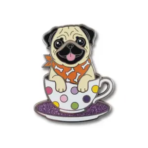 A kawaii enamel pin of a pug sitting inside a polka dot teacup wearing an orange bandana with bone patterns.