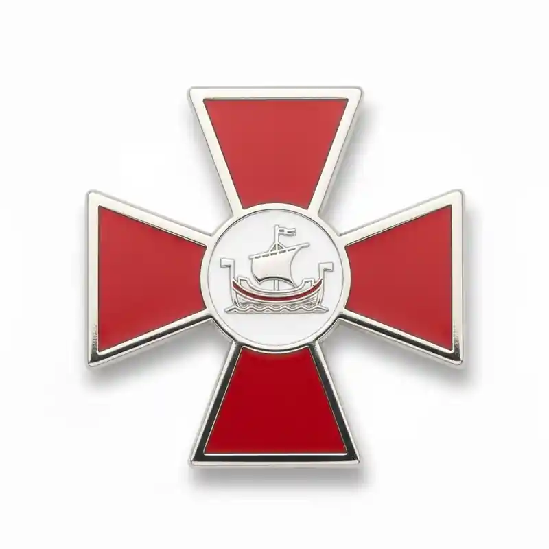 A red cross pin featuring a ship emblem in the center.