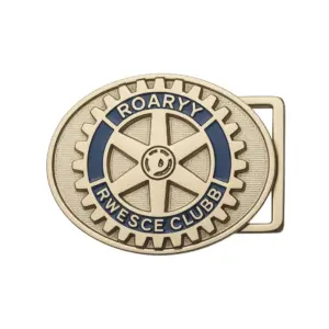 A gold-toned metal belt buckle featuring a gear wheel design with blue accents and the text Rotary Club around the edge.