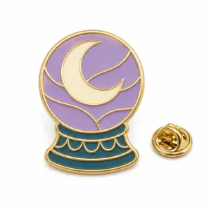 Custom crystal ball moon soft enamel pin with raised metal outlines and butterfly clutch on a white background.
