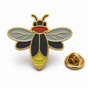 Firefly-shaped night enamel badge with attached wings, separated glow cell, gold dividers, and butterfly clutch.