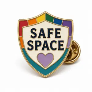 Custom safe space shield soft enamel pin with raised metal outlines and butterfly clutch on a white background.