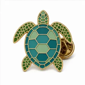 Custom sea turtle shell soft enamel pin with raised metal outlines and butterfly clutch on a white background.