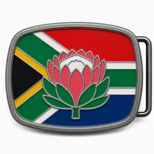 South Africa soft enamel belt buckle with antique silver frame, right side belt loop hardware, multicolor flag design with raised protea flower design on white background.