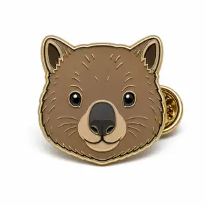 Custom wombat face soft enamel pin with raised metal outlines and butterfly clutch on a white background.