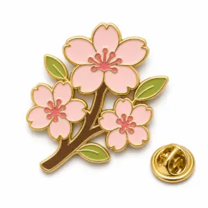 Custom cherry blossom branch soft enamel pin with butterfly clutch on clean white background.
