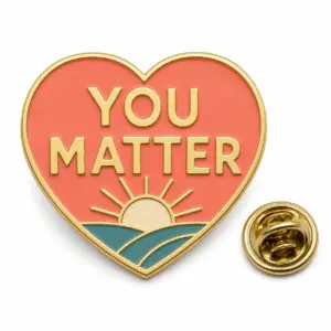 Custom You Matter heart sunrise soft enamel pin with butterfly clutch on clean white background.