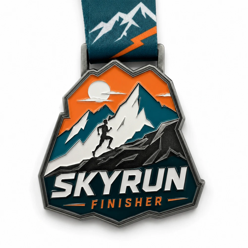 Finish gate Skyrun Medal soft enamel medal with raised metal dividers, mountain summit, arched finish shape, integrated route detail, top ring, and white background.