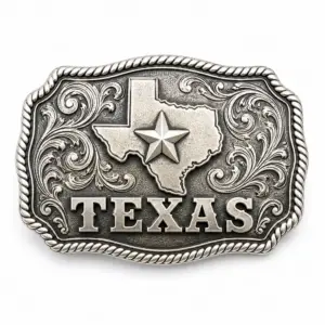 Antique silver Texas belt buckle with raised state outline, lone star emblem, western floral scrollwork, rope border, Texas lettering, and white background.
